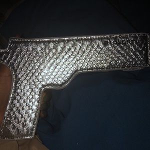 Silver gun shaped purse
